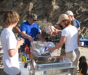 Everybody lends a hand in getting dinner ready.