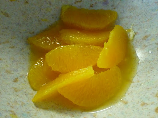 After slicing away the pith and skin, I walked Monty through the proper method of sectioning off the orange slices.