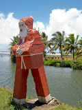 There's a Madagascar Santa Claus - some surprising combination of concrete and paint, and his hands seem to have fallen off. He's just at a random location along the side of the road north of Tamatave... who knows why? Merry Christmas Madagascar style! ;-) Madagascar6 - 103.jpg