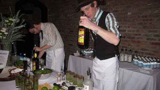 The men of Prime Meats are making Genki Des (shochu, dark rum, vanilla syrup, lime juice and basil).