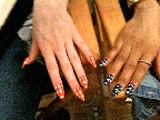 Deborah Lippmann of Deborah Lippmann Nail Polish created this gingham look based on Kate Spade fabric swatches. She and her staff sat in her office for a week filing these press-ons into edgy stiletto-shaped perfection. And though the nails were navy, orange, mint, and yellow, the models' toe nails were painted solid white.