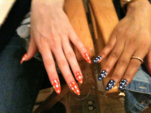 Deborah Lippmann of Deborah Lippmann Nail Polish created this gingham look based on Kate Spade fabric swatches. She and her staff sat in her office for a week filing these press-ons into edgy stiletto-shaped perfection. And though the nails were navy, orange, mint, and yellow, the models' toe nails were painted solid white.