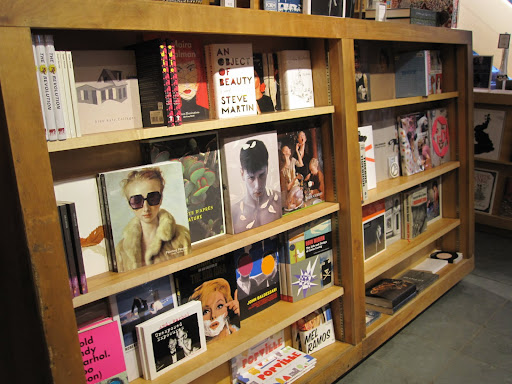 The books are arranged around the store by theme.