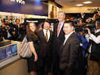 The owners of Panasonic's first Full HD 3D Home Theater System, Brad and Ashley, pose for a photo with Shiro Kitajima, President, Panasonic Consumer Electronics Company, and Michael Vitelli, President, Americas, Best Buy.