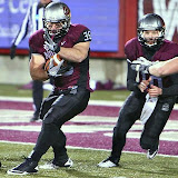 Dan Moore runs the ball after Jordan Johnson handed it off.