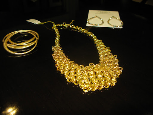 Bracelets from Alexis Bittar and earrings from Amarita Singh.