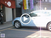 A car being blessed at the Fukagawa Fudoson temple, which specializes in car safety rituals