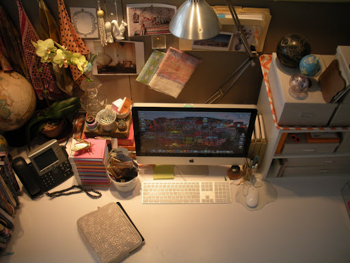 An aerial view of my desk. My iPad is stored in a quilted, Murval case. (murval.com)