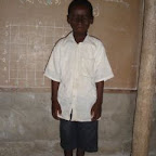 029 - TOBIAS komlan, 8 ans, CEI, de CPI au CEI, orphelin de mère, vit avec son papa