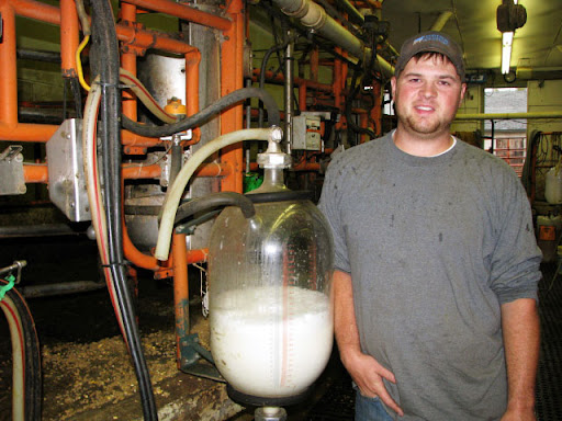 Eric Ling, a fifth-generation dairy farmer, says he knows of some Missouri dairy farmers who are losing $30,000 a month. (Photo credit: Jennifer Moore)