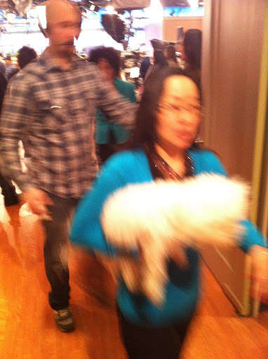Brandon is rushed to the set by foster mom and handler Kim Littlefield so he is in place for his close up.