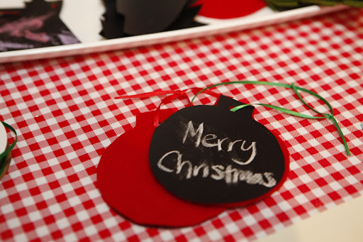 Here is an example of the felt and chalkboard ornaments/gift tags we made. They were so easy and the kids had a great time cutting, gluing, and drawing with the chalk.
