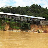 Photo6: A typical riverbank erosion site in Rajang river ：
The playground of  riverside primary school is deeply-eroded and children are no longer able to play football in the field. Along the river there are several schools facing the same situation.