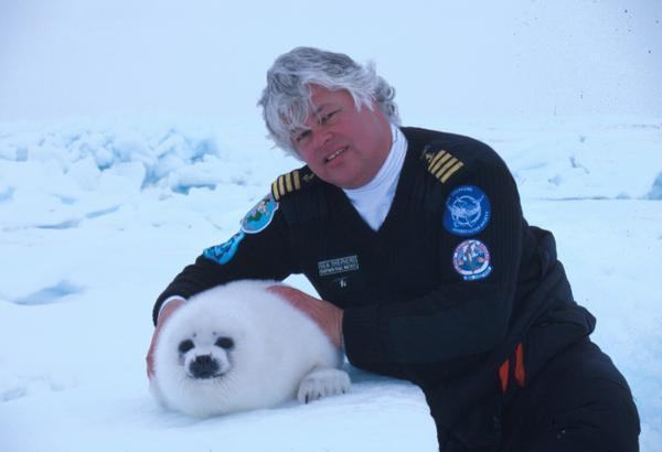 Captain Paul Watson with a baby harp seal friend. seashepherd.org