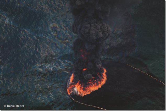 June 17, 2010. Louisiana (USA)<br />Boats burning oil on the surface near BP's Deepwater Horizon spill source. Â©Daniel Beltra/Greenpeace