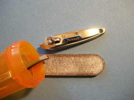 Prepare your own mini manicure kit.