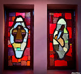 Left: It is said about Philip that he was both crucified and stoned to death.
Right: It is said about Bartholomew that he was flayed alive with a knife as a punishment for preaching the gospel. StainedWindows-0987.jpg