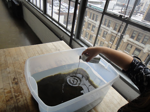 Then pour it into the water.