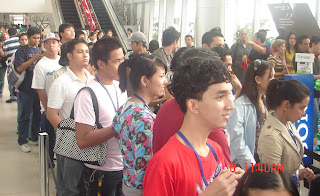 Students wait at registration booth.