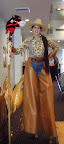 Cowgirl on stilts