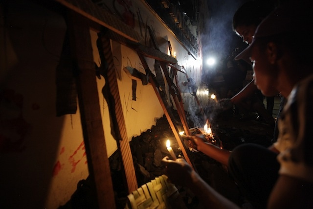 Activists hold candles during a vigil on the night after the first day of the trial of Z&eacute; Rodrigues and his brother, Lindonjonson Silva, and Alberto Nascimento, in the murder of Amazon forest activists Z&eacute; Claudio and Maria do Espirito Santo. On 15 April 2013, Lindonjonson was found guilty and sentenced to 42 years in jail, Alberto Nascimento was found guilty and sentenced to 45 years in jail, but Z&eacute; Rodrigues was acquitted. Photo: VICE