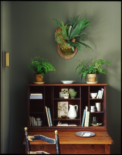 The cubbies in this drop-down desk keep small items organized. The cubbies in this drop-down desk keep small items organized.