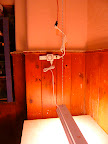 Full spectrum florescent tubes provide the best possible 'natural' light experience indoors. That's how you end up with a rosey glow like this. All done and ready for action. Now where are those seeds...?