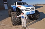 Hall Brothers Racing driver Mike Miller will take the wheel of the Ram Monster truck named “Mopar Muscle” which makes it’s debut at Monster Jam in Detroit on Jan 11, 2014. The Mopar Muscle Monster Truck is a based on a 2014 RAM Heavy Duty truck, and is powered by a 565 cubic inch supercharged version of the famous 426 Gen II Race HEMI engine which celebrates the 50th anniversary of its introduction in 2014.