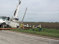 Alliant Energy Crews work to repair downed power lines in Henry County Alliant Energy Crews work to repair downed power lines in Henry County