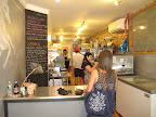 The inside of Big Gay Ice Cream Shop, which is decorated with unicorns and bright, bold colors. The inside of Big Gay Ice Cream Shop, which is decorated with unicorns and bright, bold colors.