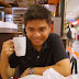 Hubby looks extremely caffeinated at Roti Mum