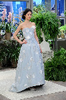This Windsor-blue silk faille strapless gown with embroidered white carnations is stunning. This Windsor-blue silk faille strapless gown with embroidered white carnations is stunning.