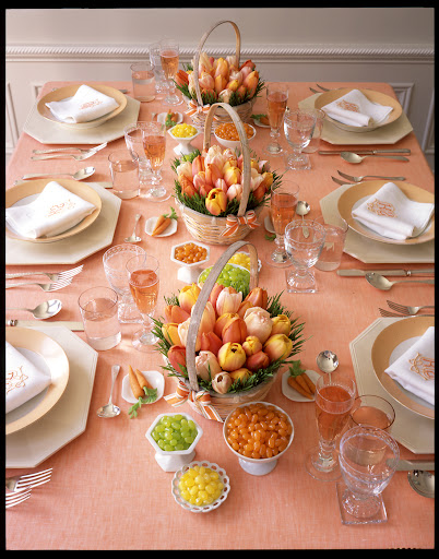 Gorgeous French tulips tucked into these basket centerpieces remind me of colored eggs.