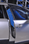 it fits nicely into the front seat of a 4-door car