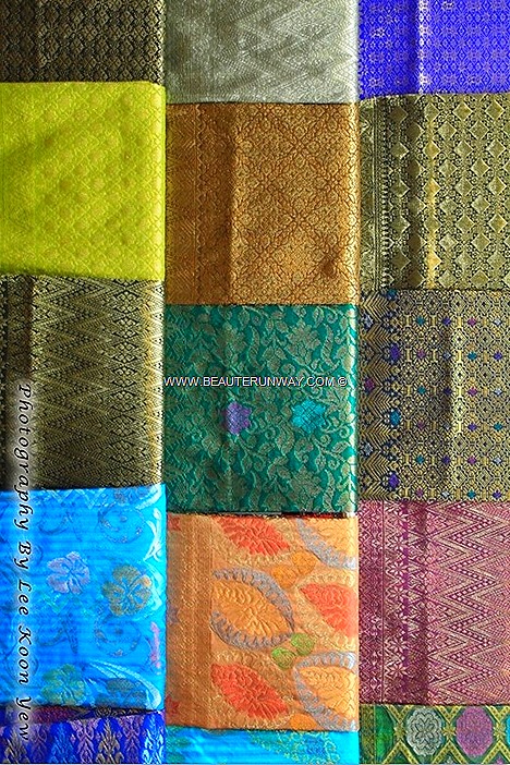 Songket weaving hand-woven intricately patterned silk or cotton brocade fabric with gold silver threads Beautiful patterns simple to sophisticated designs Kelantan luxurious fabrics weaved meticulously  live demonstrations weavers