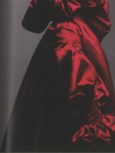 A close-up of the cape, so that you can see the material and detailing. A close-up of the cape, so that you can see the material and detailing.