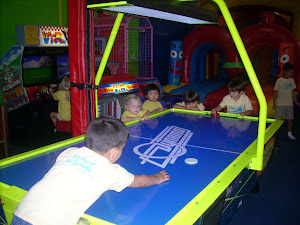 Enjoying a fun game of air hockey!