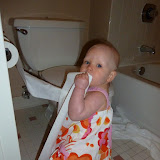 Allison discovers she can pull toilet paper
