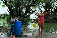 They'll whip off your shorts with the practised arm of a seasoned pick pocket, and start scrubbing.