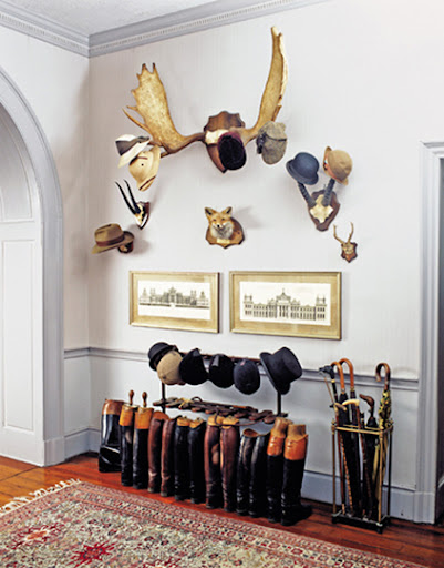 Antlers make a whimsical hat rack, and the boot display is sophisticated yet practical. (apartmenttherapy.com) Antlers make a whimsical hat rack, and the boot display is sophisticated yet practical. (apartmenttherapy.com)