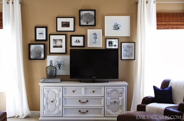 TV on dresser with gallery wall