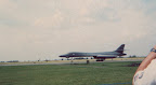 A B-1B beginning its takeoff roll.
