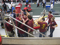 Pit crew shares high fives and fist bumps