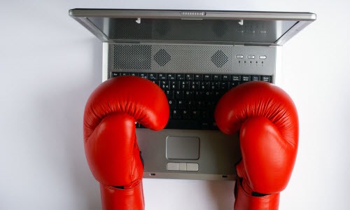 [Typing%2520with%2520boxing%2520gloves%2520500x300%2520Photoxpress_1672666%255B3%255D.jpg]
