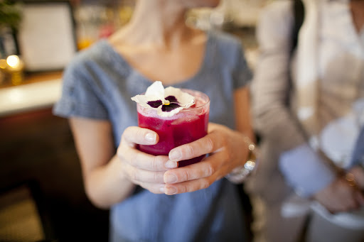 Delicious beet, pineapple, and ginger juice garnished with a fresh flower—yum! Delicious beet, pineapple, and ginger juice garnished with a fresh flower—yum!
