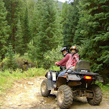Kai on an ATV with James