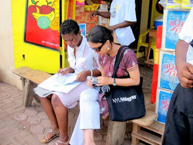 Accra, Ghana: Priyanka Gupta working with Comfort from Y-SEF, a microfinance organization based in Accra, Ghana as part of the Ghana course practicum. Photo credit: Courtney Babcock
