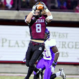 Grizzliesâ wide receiver Sam Gratton jumps up to catch a pass.