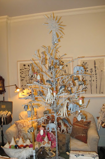 Though this tree looks extra frosty cool, it's donned with elephants and giraffes from warmer climates. Though this tree looks extra frosty cool, it's donned with elephants and giraffes from warmer climates.
