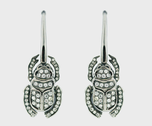 Steckel has a way with curiosities. These earrings are the perfect example.